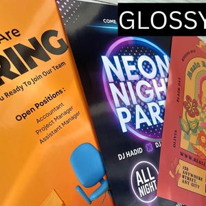 May include: A stack of glossy flyers with bold text and graphics. One flyer is orange and advertises open positions for Accountant, Project Manager, and Assistant Manager. Another flyer promotes a Neon Night Party with DJ Hadid. A third flyer is red and features a floral design.