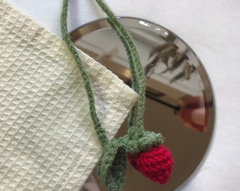Crochet strawberry bookmark