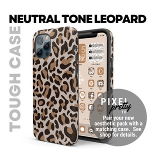 May include: A neutral tone leopard print phone case for an iPhone. The case is made of a tough material and has a black border. The phone case is shown next to a phone with a matching leopard print aesthetic theme. The phone screen shows a calendar widget, app icons, and the text "PIXEL pretty TX".