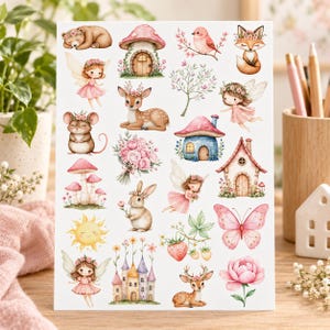 May include: A sticker sheet featuring watercolour illustrations of woodland creatures, fairies, mushrooms, flowers, and small houses. The designs include a sleeping bear, a fox, a deer, a rabbit, a mouse, a butterfly, and various floral elements in soft pinks.