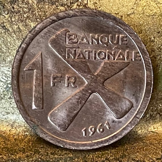 1961年カタンガ1フラン硬貨：プランテン＆クロス、コンゴの宝飾品 