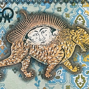 May include: A close-up of a 200 Tenge banknote from Kazakhstan featuring a stylized image of a mythical creature with a human face and a tiger-like body. The creature is depicted in gold and brown against a blue and green background with intricate geometric patterns.