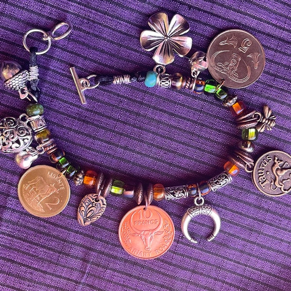 Taurus/Ferdinand the Bull genuine world coin jingle charm bracelet (flower–bell–tinkly heart–bee–moon) Czech glass, silver toggle (zodiac)