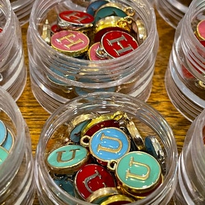 Letter charms–choose black, white, blue, pink, red, yellow, purple or green. Spell name, initials (double sided enamel alphabet jewelry)