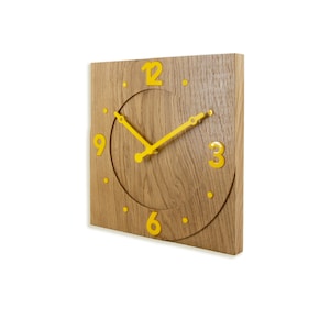Square Oak Wall Clock with Yellow Numerals: Modern Inlay Design