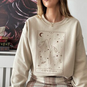 Sweatshirt Steenbok Steenbok cadeau Steenbok geschenken geboorte januari bloemenshirt geboortemaand trui horoscoop ronde hals sterrenbeeld shirt