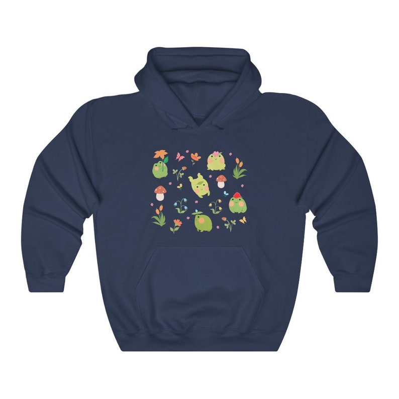 May include: Navy blue hooded sweatshirt with a pattern of green frogs, flowers, and mushrooms.