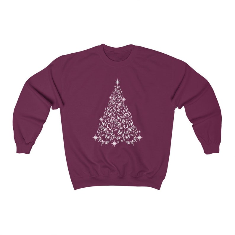 May include: A maroon sweatshirt featuring a white design of a Christmas tree made up of cat faces.
