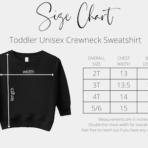 May include: Size chart for a toddler unisex crewneck sweatshirt. The chart shows the overall size, chest width, and body length in inches for sizes 2T, 3T, 4T, and 5/6.