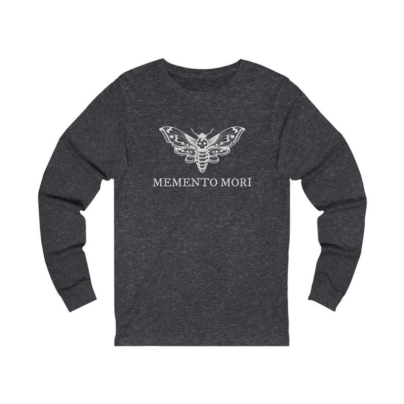 May include: A dark heather grey long-sleeved t-shirt with a white moth graphic and the text "MEMENTO MORI" printed on the front.