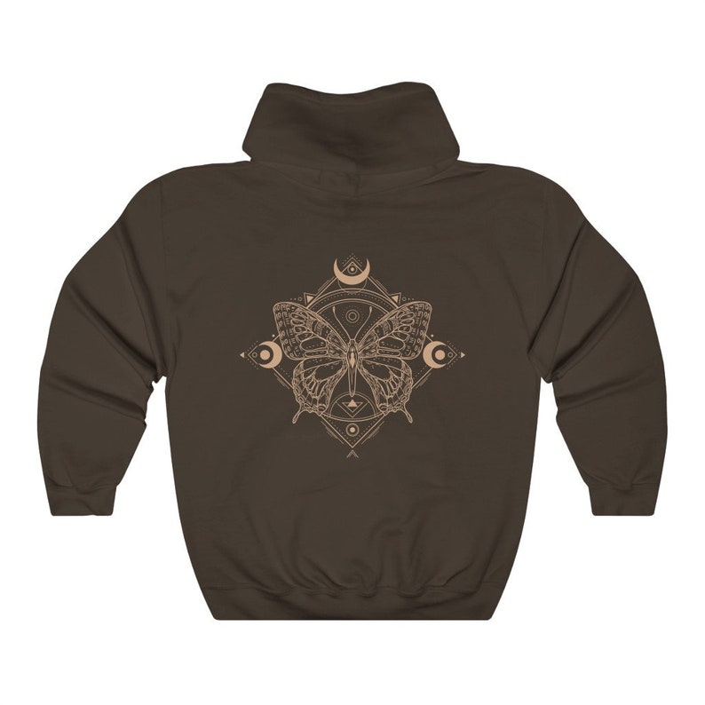 May include: A brown hooded sweatshirt with a graphic of a butterfly inside a geometric design with moons and stars.