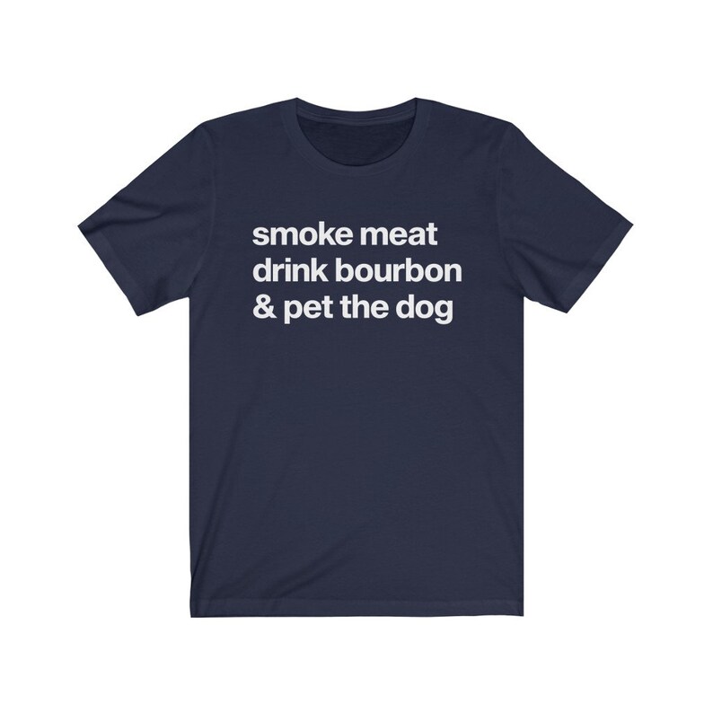 May include: Navy blue t-shirt with white text that reads "smoke meat drink bourbon & pet the dog".