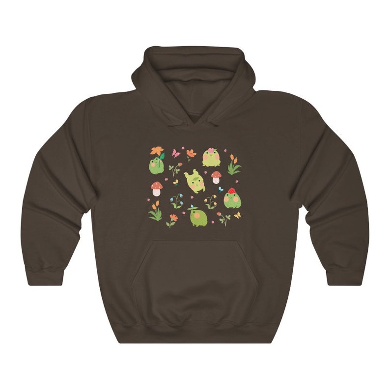 May include: A brown hooded sweatshirt with a pattern of green frogs, flowers, and mushrooms. The frogs are wearing hats and some are holding flowers.