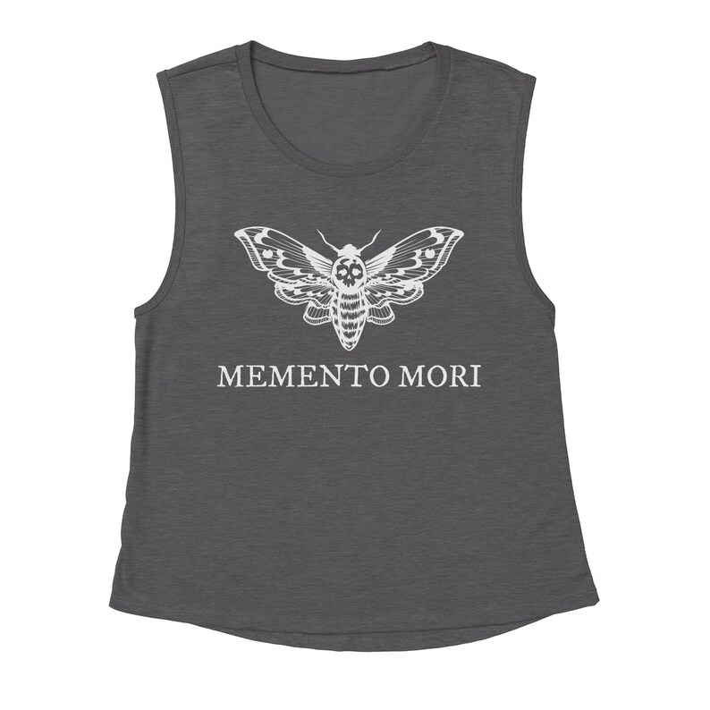 May include: A dark gray sleeveless muscle tank top with a white graphic of a moth with a skull on its body. The text "MEMENTO MORI" is printed below the moth.