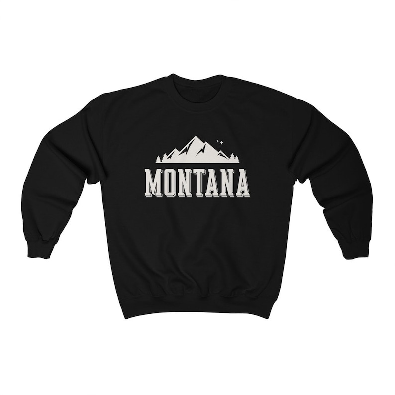 May include: Black sweatshirt with a white mountain graphic and the text "MONTANA" in a white vintage font.