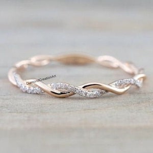 Infinity Twisted Shank Wedding Band Round Cut Moissanite Band In 14K Rose Gold Colorless Moissanite Engagement Ring  Lab-Grown Diamond Band