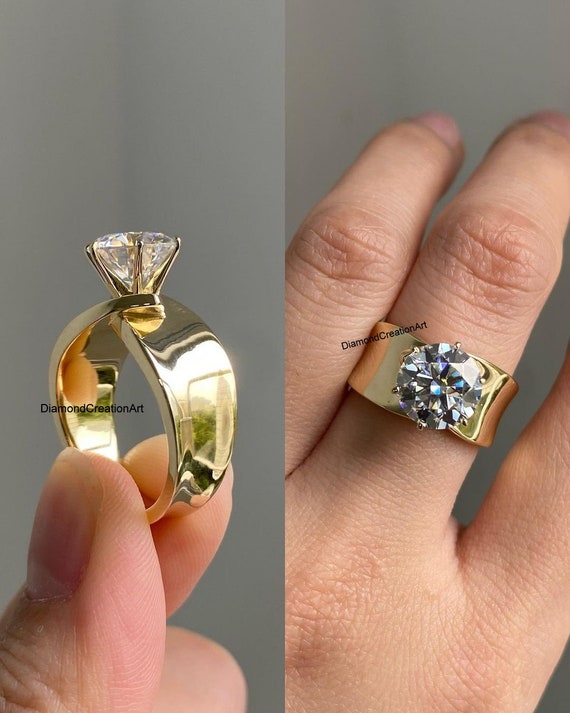 Wide wedding bands with solitaire top