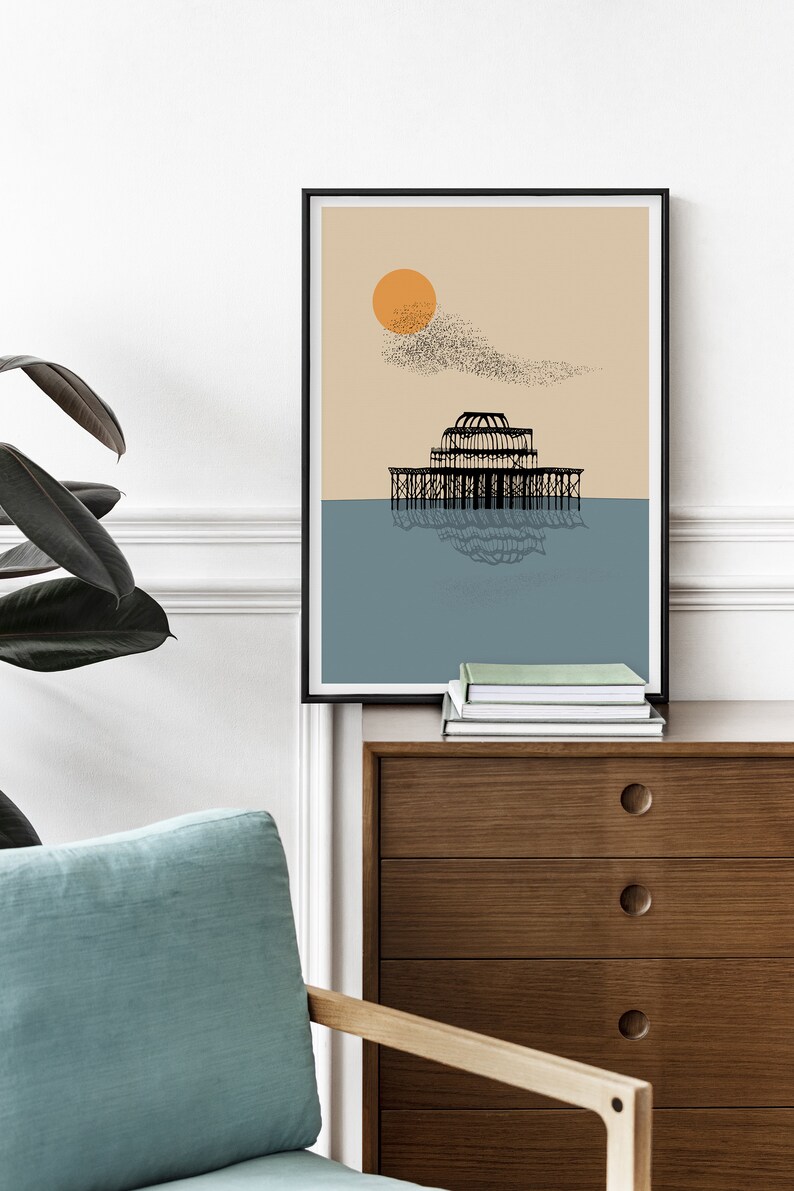 May include: A minimalist black and white illustration of a pier with a large orange sun and a flock of birds flying overhead. The background is a light beige color and the water is a light blue.