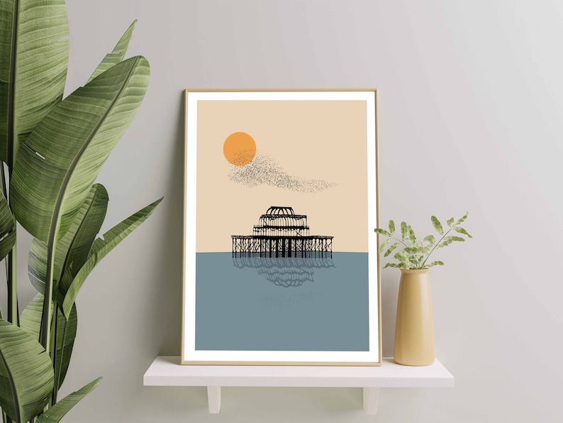 May include: A minimalist art print featuring a black silhouette of a pier with a reflection in the water. The background is a light peach color with a large orange sun and a flock of birds flying overhead.