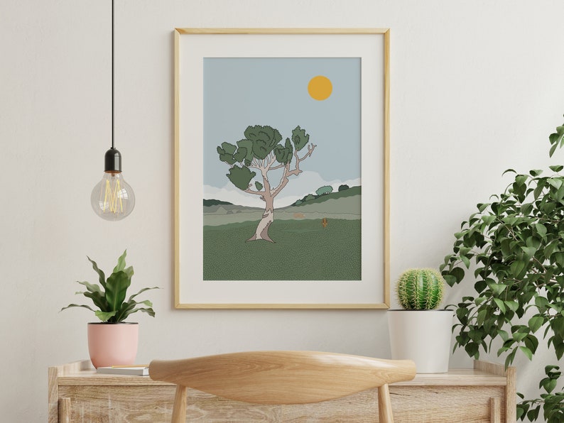 May include: A framed illustration of a stylized tree with a yellow sun in a blue sky. The tree is green and brown and is set against a green field with a brown hill in the background.