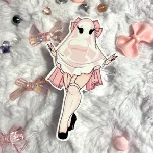 May include: A pink and white ghost wearing a pink dress and white stockings. The ghost has a pink bow on its head and is holding its hands up in a playful pose.