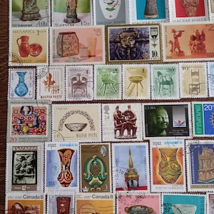 Pots, art, utensils, jewelry stamps lot no. 43