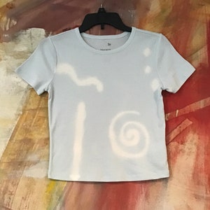 Light blue hand made tee shirt design; original t shirt design; blue  top; custom t shirt; arty blue top; graphic blue top; cute blue top