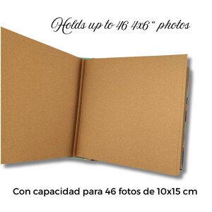 May include: Open brown photo album with text reading "Holds up to 46 4x6" photos." The album is open, revealing blank pages. The album's pages are a light brown color. The album is designed to hold 46 photos.