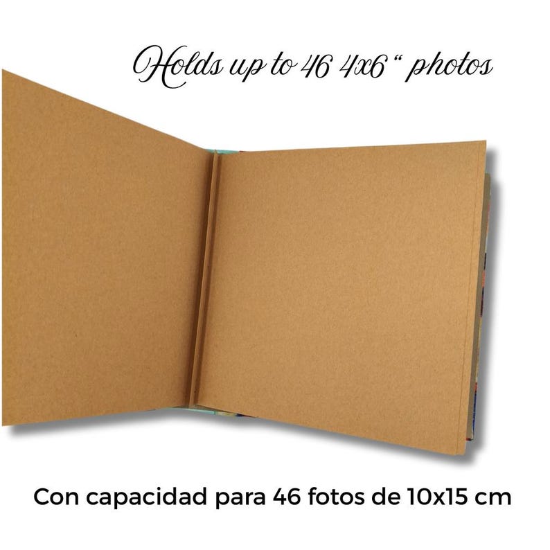 May include: Open brown photo album with text reading "Holds up to 46 4x6" photos." The album is open, revealing blank pages. The album's pages are a light brown color. The album is designed to hold 46 photos.