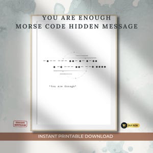 May include: A white rectangular wall art print featuring the black text YOU ARE ENOUGH MORSE CODE HIDDEN MESSAGE at the top. The center displays black Morse code dots and dashes arranged in a circular pattern, with the text You Are Enough below.