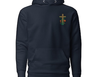Könnte beinhalten: Ein marineblauer Hoodie mit einem kleinen gestickten Kreuz und Blumen auf der linken Brust.