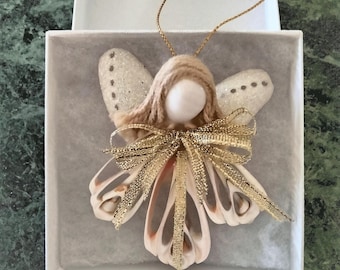 Adorno navideño de ángel de concha - En caja