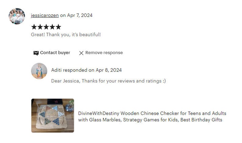May include: A wooden Chinese checkers game board with glass marbles. The board is made of light brown wood and has a star-shaped design. The marbles are blue, green, and red.