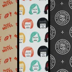 Schitt's Creek Moira's Wigs, You're my Bebe, Rosebud Apothecary, Rosebud Motel Licensed by Camelot Fabric Novelty Cotton Fabric