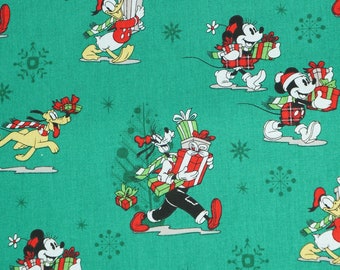 Mickey & Friends Gift Giving Licensed Novelty Cotton fabric Goofy Pluto Minnie Donald