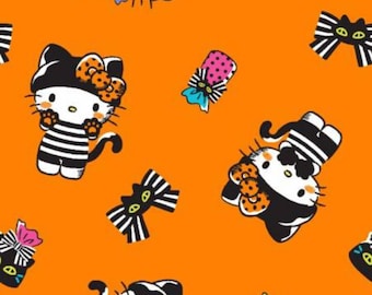 Hello Kitty Halloween Fabric, Hello Kitty Halloween Bows on Orange Licensed by Sanrio for Springs Creative Novelty Cotton Fabric