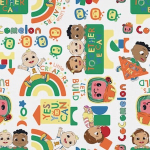 May include: A white fabric pattern featuring Cocomelon characters, rainbows, and building blocks. Text includes "CoComelon," "Together We Can," "Let's Build," "Little Creators," "Yes You Can," and "I Can Fix It" in various colors and fonts.