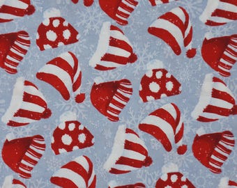 Tossed Red and White Christmas Hats on Bluish Gray From Henry Glass By Barb Tourtillotte Christmas Quilting Cotton Fabric 9707-90