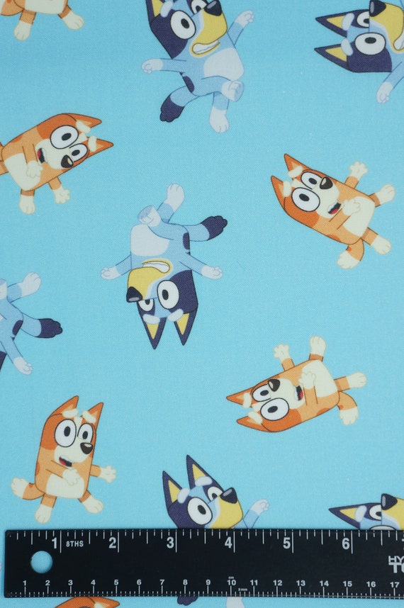 Bluey Fabric, Disney Junior Bluey and Bingo on Light Blue Licensed