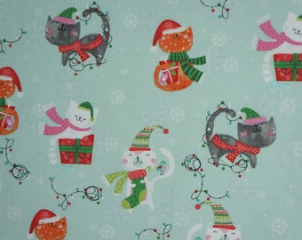 Cats with Presents and Christmas Lights on Light Green Christmas Novelty Cotton Fabric