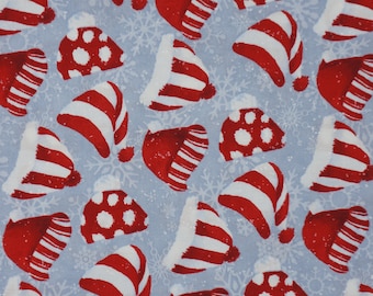 Tossed Red and White Christmas Hats on Bluish Gray From Henry Glass By Barb Tourtillotte Christmas Quilting Cotton Fabric 9707-90