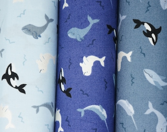 Pearlized Tossed Narwhals, Killer Whales, and Beluga on Blue by Lewis and Irene Small Things Polar Animals Quilting Cotton Fabric