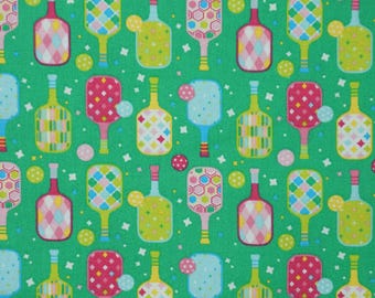 Pickleball Fabric, Pickle Ball Paddles on Green by Fabric Traditions Novelty Cotton Fabric, Pickle ball Paddles