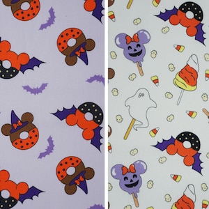 May include: A fabric pattern featuring two distinct sections. The left side displays orange and black bat-winged donuts on a light purple background. The right side shows purple ghost-shaped treats, candy corn, and donuts on a white background.