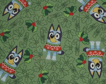 Bluey Christmas Fabric, Bluey Holly Greenery on Green Licensed by Ludo Studios for Springs Creative Novelty Cotton Fabric