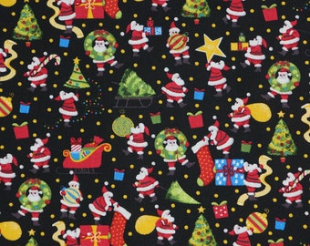 Mini Tossed Santas with Presents Black by Fabric Traditions Quilting Cotton Fabric