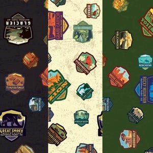 May include: A fabric pattern featuring three vertical panels in black, cream, and dark green. Each panel is covered in various colorful, shield-shaped patches representing different U.S. National Parks, including Glacier, Zion, and Yosemite.