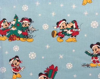 Mickey and Minnie Santas Christmas Day Novelty Licensed Novelty Cotton Fabric