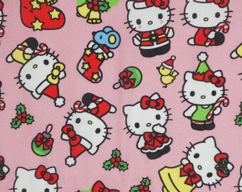 Hello Kitty Christmas Fabric, Hello Kitty and Friends Christmas on Pink Novelty Cotton Fabric, Sanrio Licensed by Springs Creative