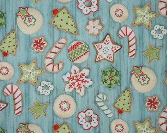 Christmas Cookie Fabric, Christmas Sugar Cookies with Icing designed by Susan Winget for Springs Creative Novelty Cotton Fabric